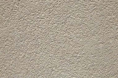 Sorunsuz kakılmış bej sıva duvar doku arka plan.