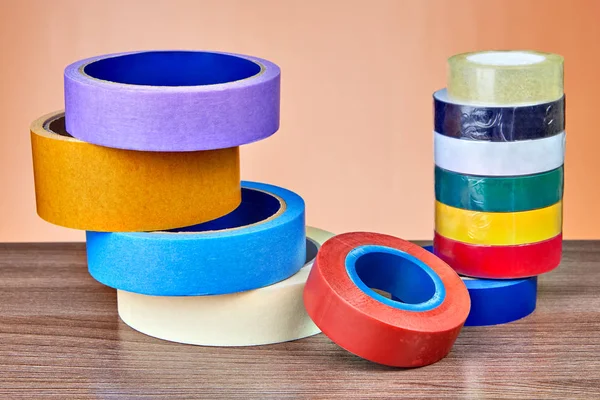 Dos Pilas Rollos Coloridos Cinta Adhesiva Sobre Fondo Naranja — Foto de Stock