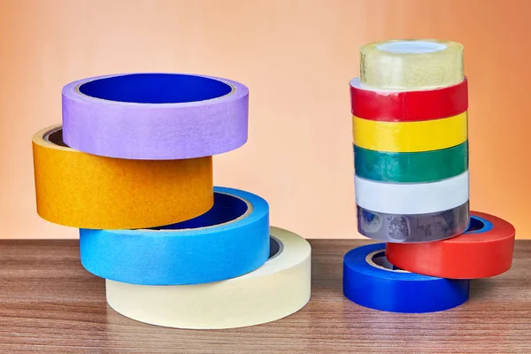 Dos Pilas Rollos Cinta Adhesiva Multicolor Sobre Fondo Naranja — Foto de Stock