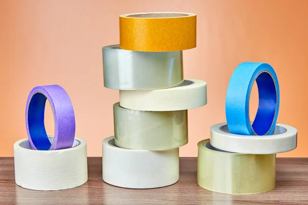 Handful Packing Tape Painter Masking Tape Orange Background — Stock Photo, Image