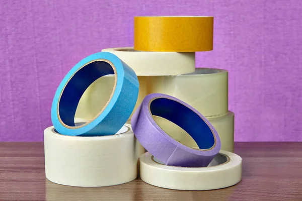 Transparent Packing Tape Colored Masking Tape Lies Table Purple Background — Stock Photo, Image