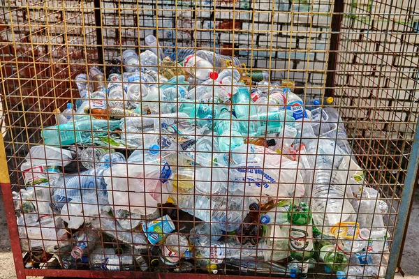 Overloaded with bags of waste, vehicle moves on higway, Shiraz, Iran. –  Stock Editorial Photo © grigvovan #167601202