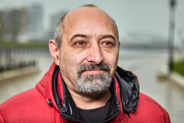 Bald gray-haired man with a beard. — Stock Photo, Image