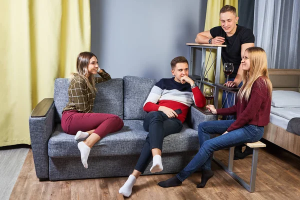 Cheerful conversation in a student dormitory.