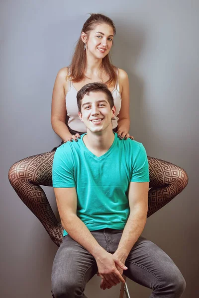 Young Caucasian Man Sits Chair His Woman Sits Back Chair — Stock Photo, Image