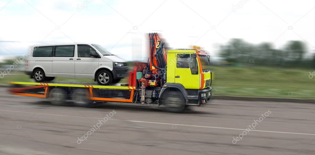 Blur, Lubrication, car tow truck transports a car