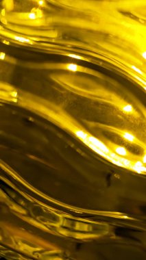 Soyut sıcak kıvrımların turuncu ve sarı arkaplanı, sıcak dalgalar, neon ışıklı sürekli çizgiler. Kart ya da pankart şablonu. Renkli dalgalı duvar kağıdı