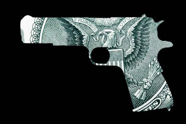 Silah ve para. Çekimleri Amerika'da temsil eden. Silah şeklin üzerine Amerika Birleşik Devletleri dolarlık banknot detay 