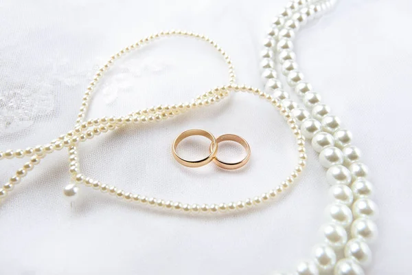 Gold Wedding Rings Lie Wedding Dress Background Necklace Pearls Stock Photo