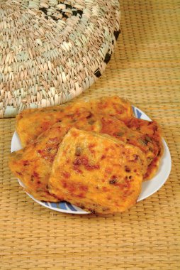 Geleneksel Fas gözlemesi, sebzeli fare adam.