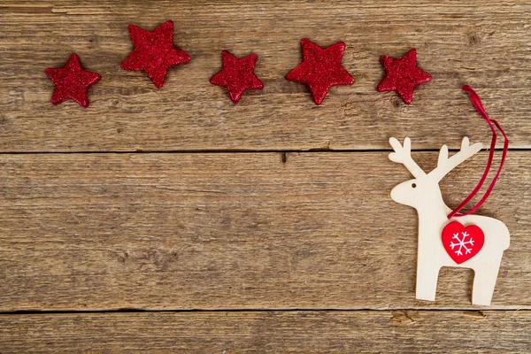 Kerst decoraties rendieren en sterren — Stockfoto