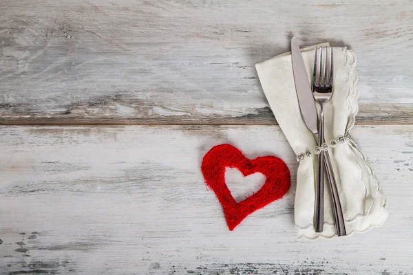 Table setting with heart on wood — Stock Photo, Image