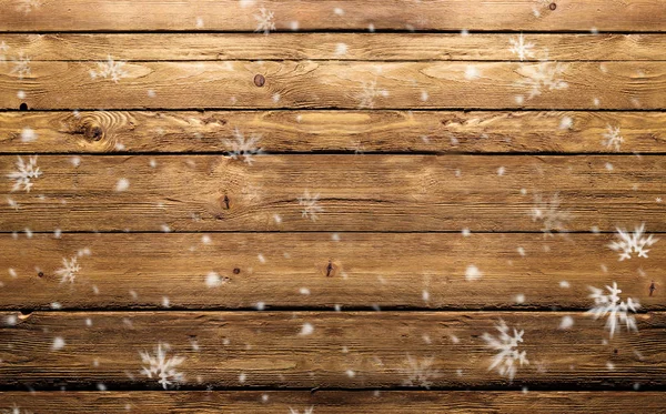 Fondo de madera con copos de nieve — Foto de Stock