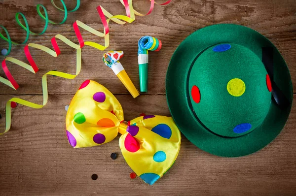 Clown hat and carnival accessories — Stock Photo, Image