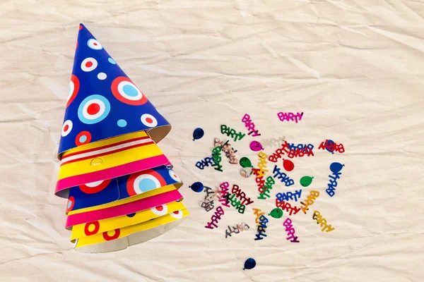 Birthday cone hat on paper — Stock Photo, Image