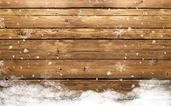 Zimní dřevěné pozadí se sněhové vločky Stock Obrázky