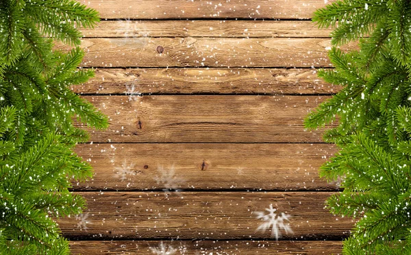 Frame of fir branches and snowflakes — Stock Photo, Image