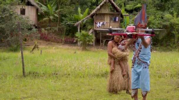 Indigenous Man Is Shoots A Drone That Is Flying Over His Village — Stock Video