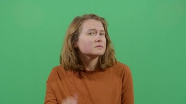 Woman Using Hands As Hearing Device