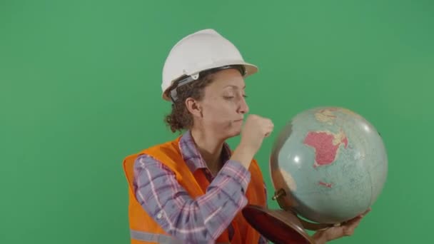 Woman Engineer Listen And Knock Globe — Stock Video