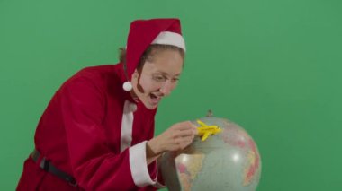 Kadın Noel Baba Dünya 'da Uçan Bir Uçak