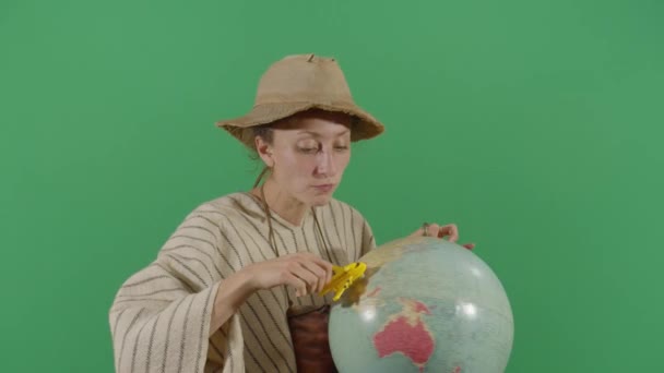 Woman Peasant Flying Airplane On Globe — Stock Video