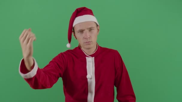 Erwachsener mann weihnachtsmann macht faustzeichen — Stockvideo