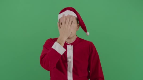 Adulto uomo Babbo Natale schiaffi la fronte — Video Stock
