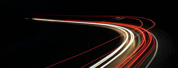 Luzes de carros com noite — Fotografia de Stock