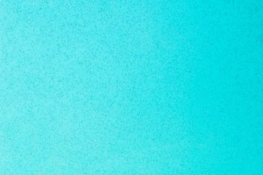 Açık mavi, siyah benekli plastik.