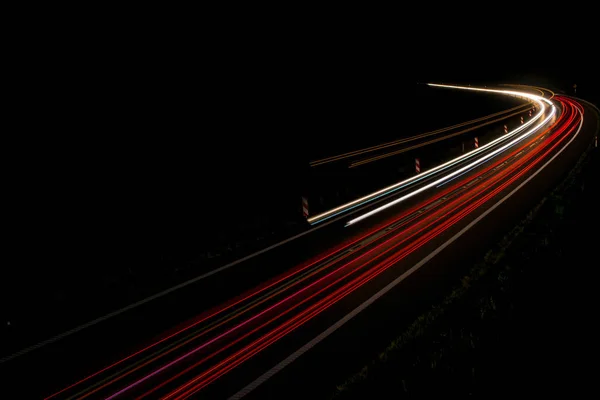 Luzes de carros com noite — Fotografia de Stock