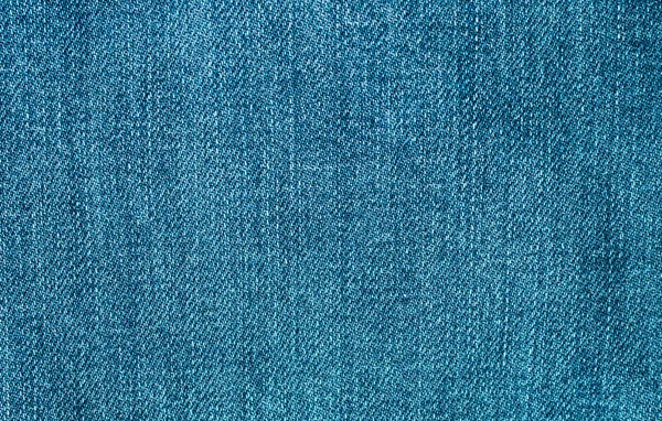 Blauwe jeans textuur of achtergrond materiaal — Stockfoto