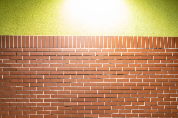 Brick wall and yellow wall texture. — Stock Photo, Image