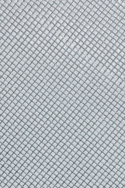 Gevlochten stalen mesh textuur of achtergrond — Stockfoto