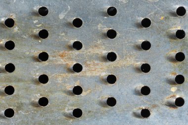 Metal ve delikli yakın çekim. doku veya arkaplan