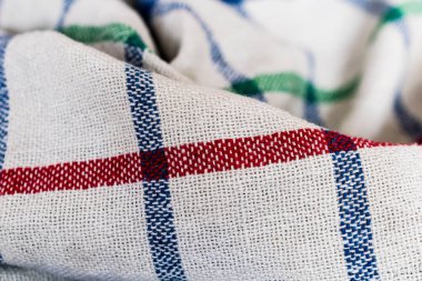 Katlanmış katlanmış çok renkli damalı yün kumaş arkaplanı