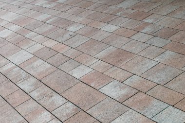 Kahverengi kaldırım taşları. doku.