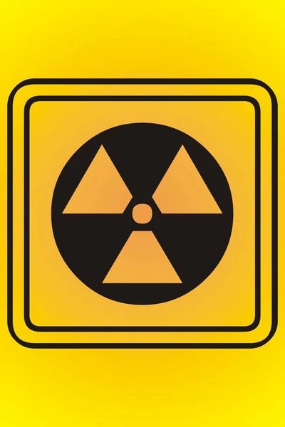 放射線標識だ 黄色の背景の正方形のテーブル — ストック写真