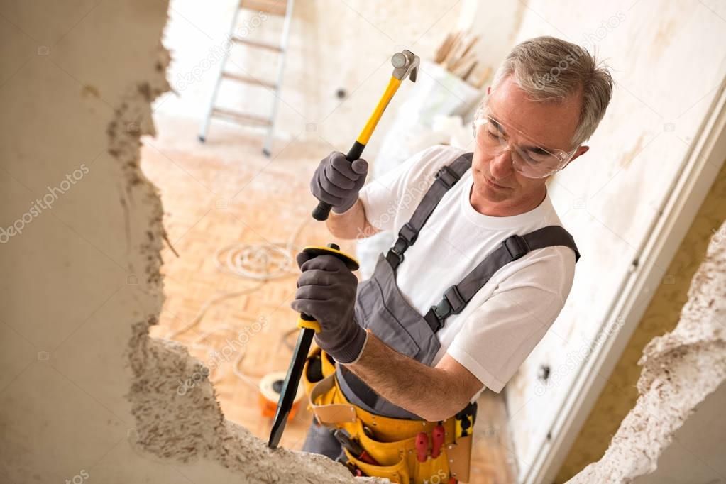 Construction man using hammer