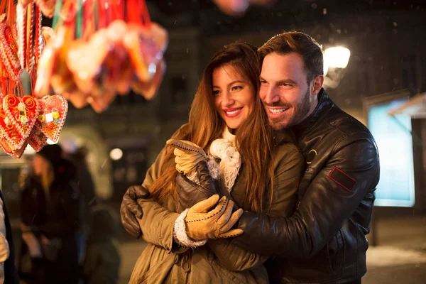 Smiling young couple shopping time at Christmas — Stok Foto