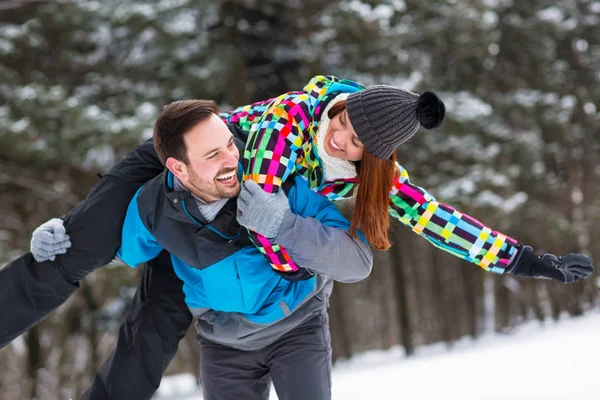 Young man carry off on back his love — Stock Photo, Image