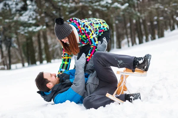 Couple having fun on snow winter day — Stock Photo, Image