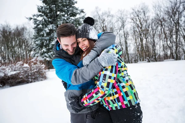 Couple in hug enjoy at winter holiday — Stock Photo, Image