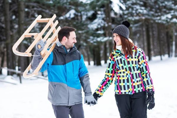 Couple having fun on winter sunny day — Stock Photo, Image