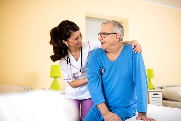 Smiling happy senior man at nursing home — Stock Photo, Image