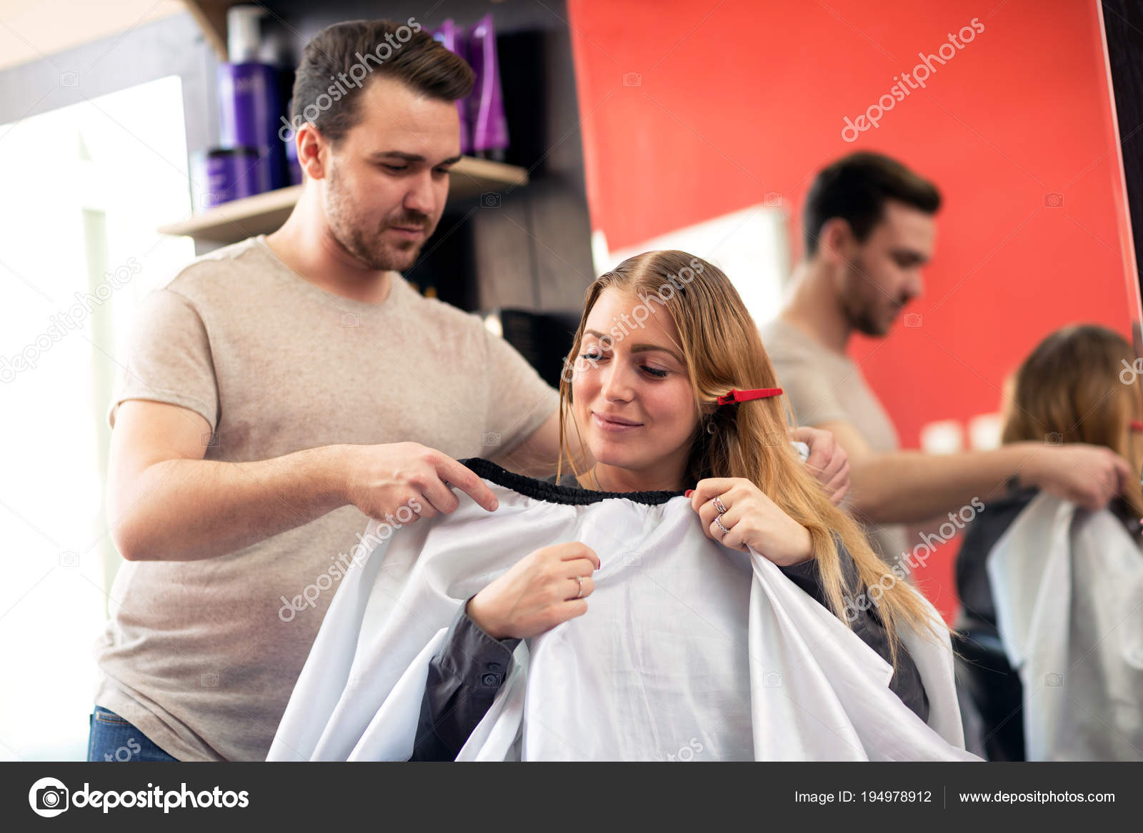 Male Hairdresser Puts Coat To Blonde Client At Beauty Salon