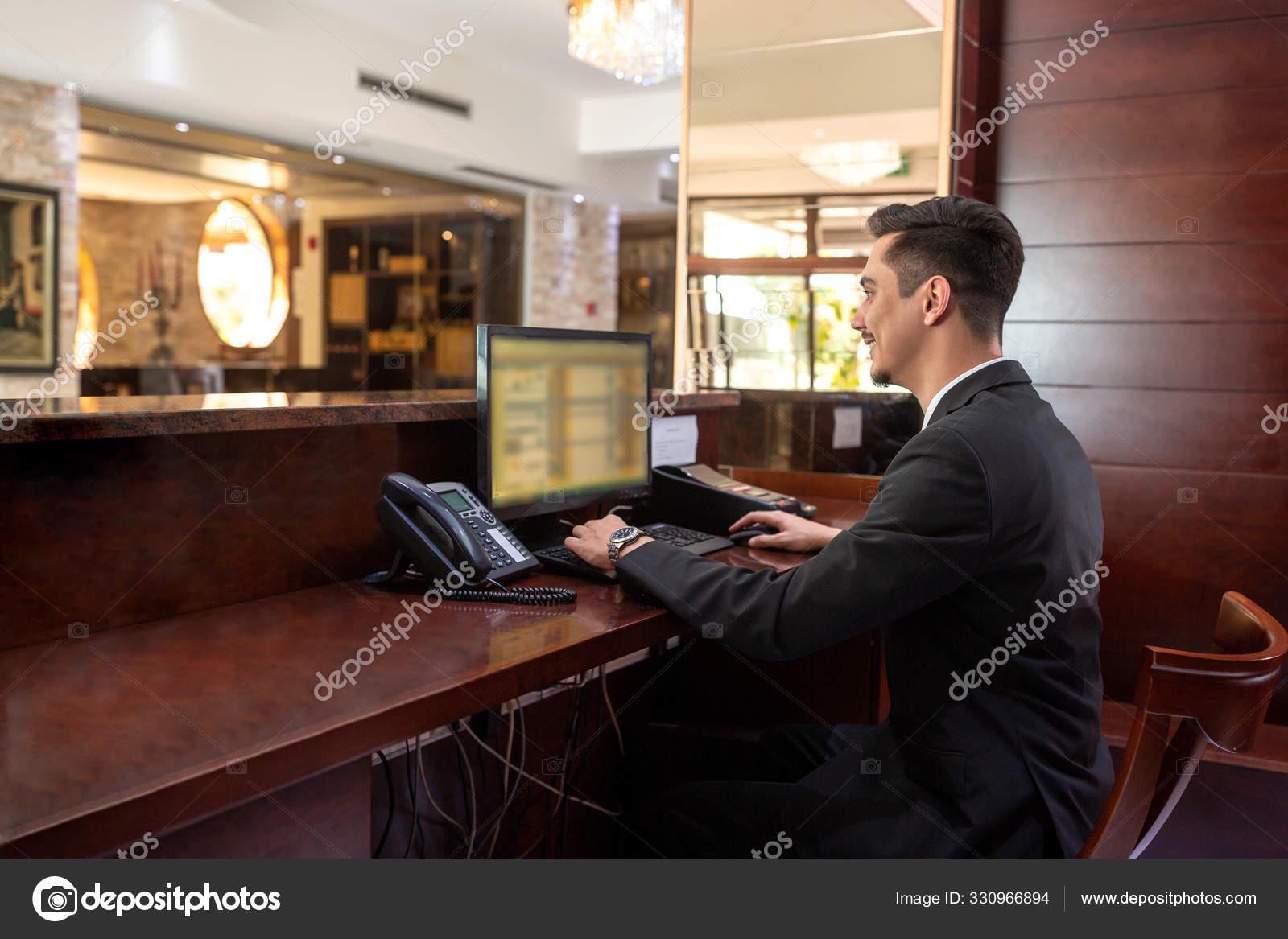 Front Desk Hotel Receptionist Working Stock Photo C Didesign