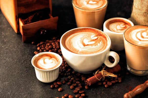 Caffe latte and a bunch of coffee beans — Stok fotoğraf
