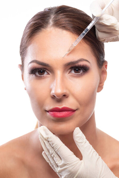 Beautiful woman having an antiaging treatment, repairing facial skin