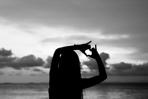 Woman hands forming a heart — Stock Photo, Image